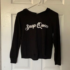 Thin, black, “snap queen” sweatshirt